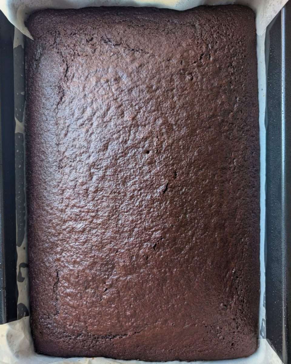 Stir-and-bake cake in a tin fresh from the oven