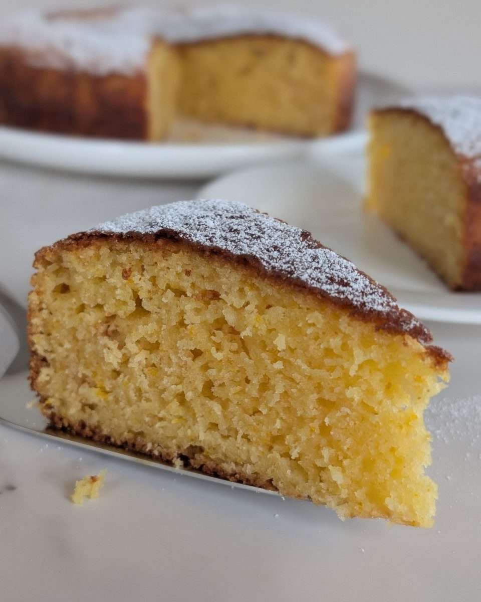 a slice of tender orange cake